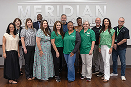 Eagles Leadership Convocation gathers for Class of 2027 photo. Front row from left are Dr. Leia Hill, Heather Ammon, Erica Stokes, Tracy Stockton, Mya Adams, Janet Parrett, and Brandi Pickett. Back row from left are Glenda Sanders, Will Nathan, Anthony D’Angelo, Marquita James, Dr. Tom Huebner, and Mark Brentnall. 