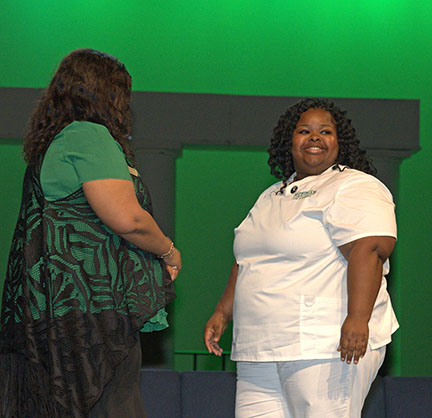 April Shield receives her Practical Nursing pin.