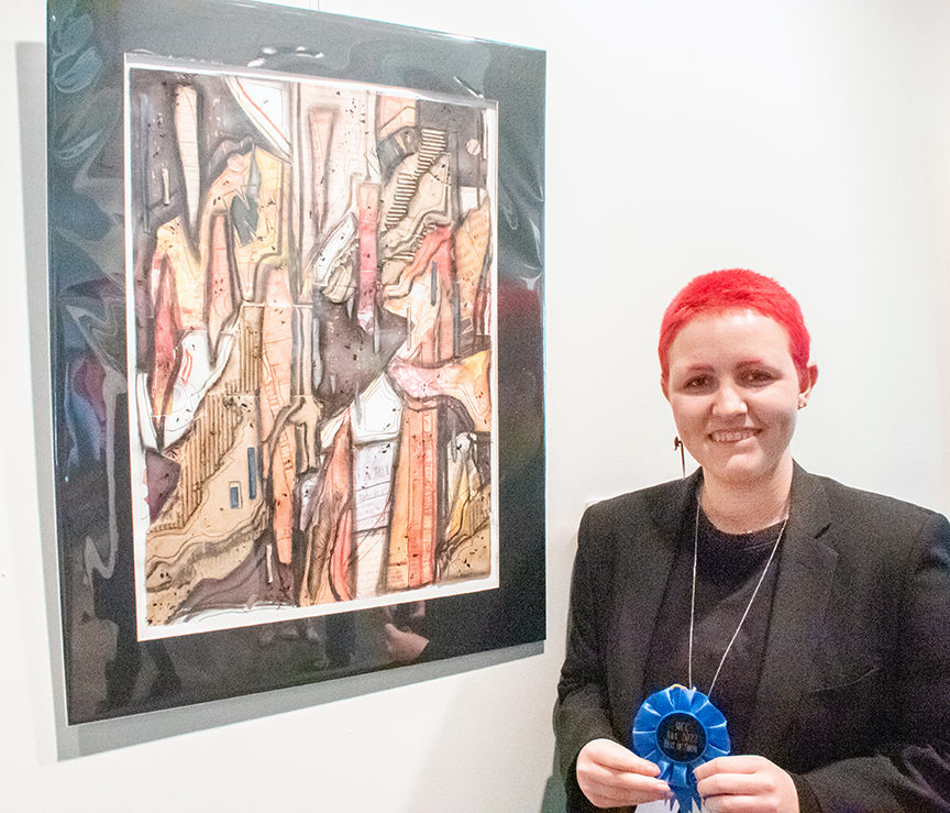 MCC art student Meagan Hembree wins first in the College’s Fine Arts Student Competition for her work, “No War.”