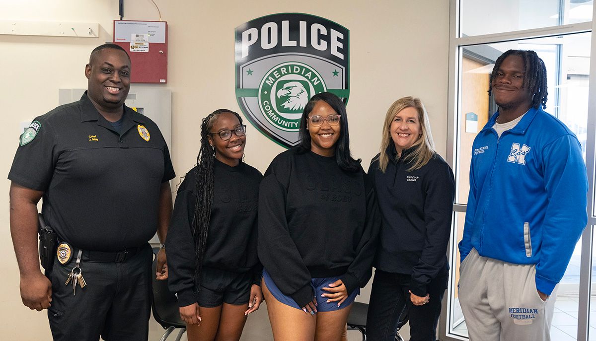 Gathering in the campus police office are Campus Police Chief Joshua May, left, Zy’Keria Ford, Courtney Smith, Jan Freeman, and Carson Willis. Gathering in the campus police office are Campus Police Chief Joshua May, left, Zy’Keria Ford, Courtney Smith, Jan Freeman, and Carson Willis.