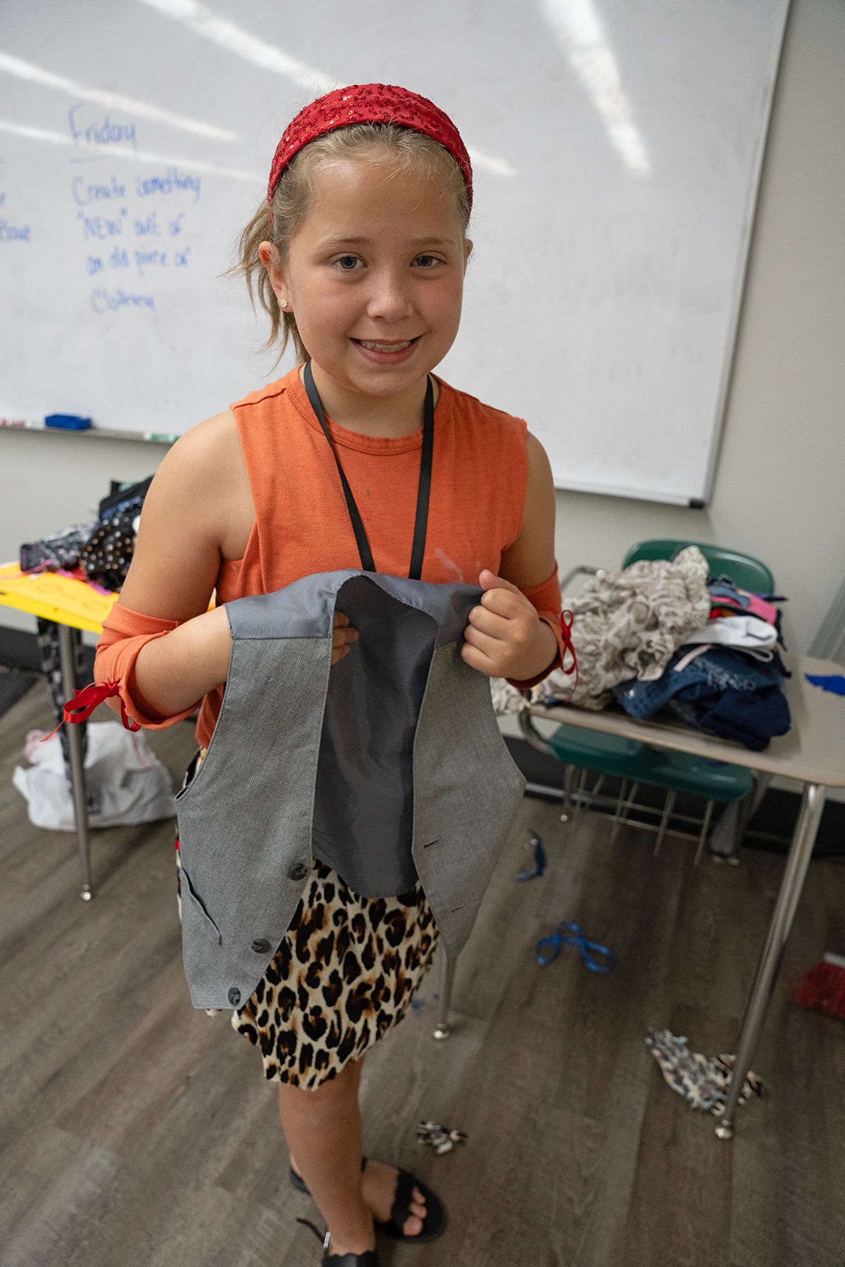 Cecilia Reeves shows the outfit she designed in Fashion Designers 101.