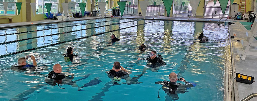 Divers refine their skills at the College’s Damon Fitness Center pool. 