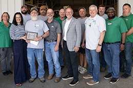 Albert Espey and his colleagues pose at the MCCer of the Month award presentation. 