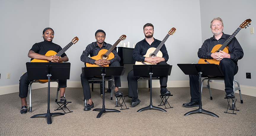 MCC Guitar Ensemble members include Alexandria Bailey, Jharmain Inge, Dy lan Laird, and Mitch Brantley, director.