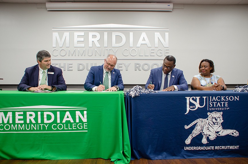 Michael Thompson, MCC vice president for academic affairs, left, MCC President Dr. Thomas Huebner, Jackson State University President Thomas K. Hudson and Dr. Alisa Mosley, JSU provost and senior vice president for academic affairs, gather at the signing of the articulation agreement event for the two educational institutions. 