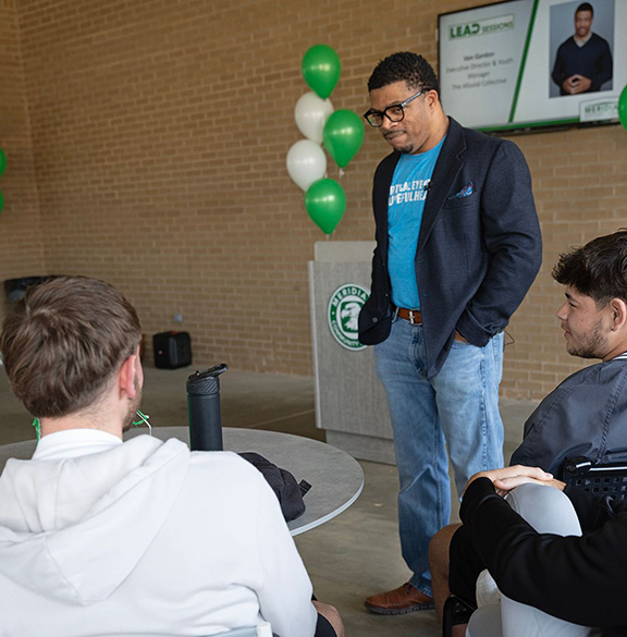 Speaker Von Gordan listens to students during the LEAD session. 