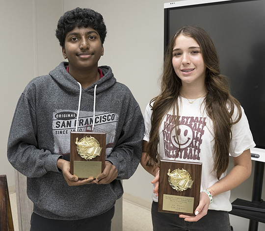 Eighth-grade winners are from left Deva Ravichandran, second, and Neveah Gilmer, first. Not pictured is Caden Purvis, who won third place. 