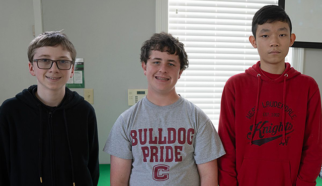 Eighth-grade winners are from left: Dylan Null, first; Lucas Moore, second; and Matthew Chen, third. 