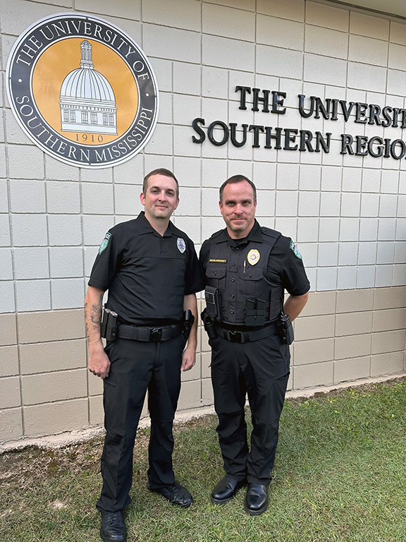Matthew Atchison, left, with MCC Campus Police Chief Casey.