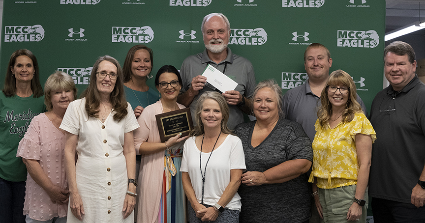 At the celebration for Jet Scarbrough being named MCCer of the Month are Theresa Hogan, left, Diane Wells, Kay Thomas, Brandy Hill, Leia Hill, Scarbrough, Amy Miller, Joy Smith, Matthew Milner, Amanda Bratu, and Tony Boutwell. 