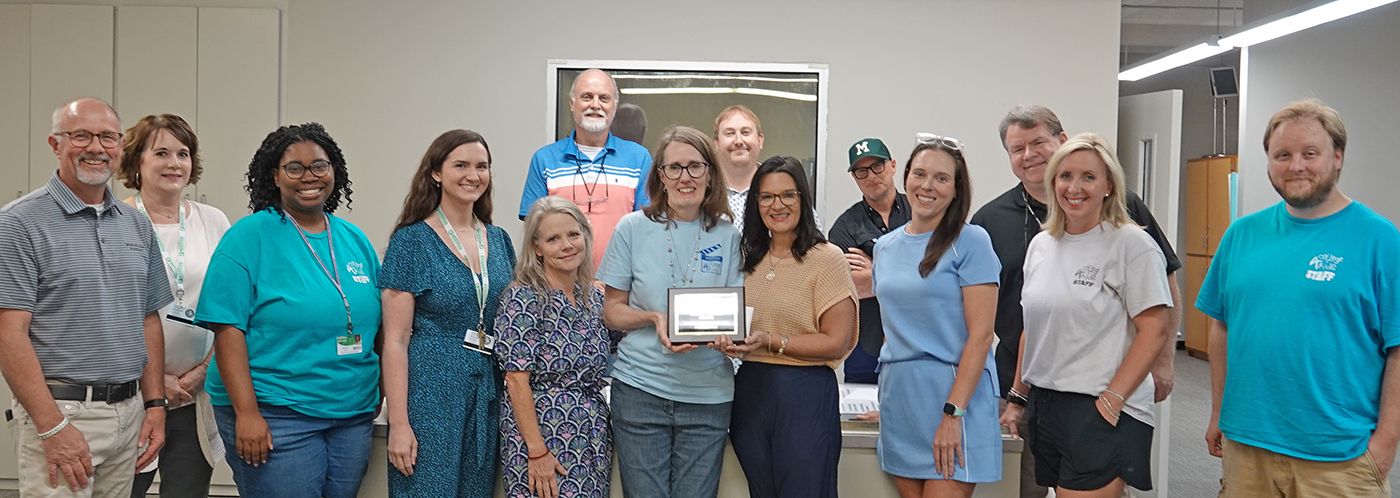 Dr. Tom Huebner, Glenda Sanders, Tanisha Clark, Desi Leeper, Amy Miller, Jet Scarbrough, Kay Thomas, Matt Milner, Dr. Leia Hill, Mark Brentnall, Lindsay Taylor, Tony Boutwell, Casey Holladay, and Hunter Heath pose for a photo at the MCCer of the Month award presentation. Dr. Tom Huebner, Glenda Sanders, Tanisha Clark, Desi Leeper, Amy Miller, Jet Scarbrough, Kay Thomas, Matt Milner, Dr. Leia Hill, Mark Brentnall, Lindsay Taylor, Tony Boutwell, Casey Holladay, and Hunter Heath pose for a photo at the MCCer of the Month award presentation.
