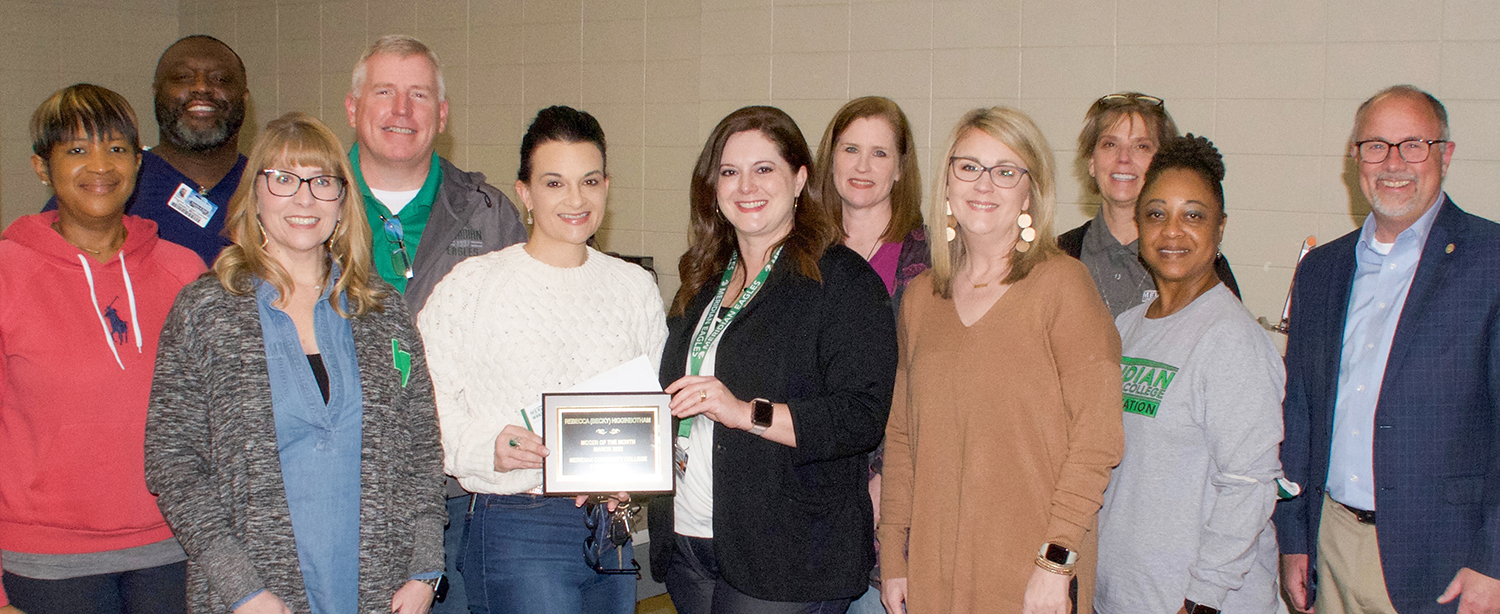 Joining the celebration announcement of the MCCer of the Month are Crystal Webster, Dr. Tommy Winston, Amanda Bratu, Leia Hill, Rebecca Higginbotham, Dr. Lara Collum, Samanta Shelby, Valerie Bishop, Rhonda Smith and Dr. Thomas Huebner.