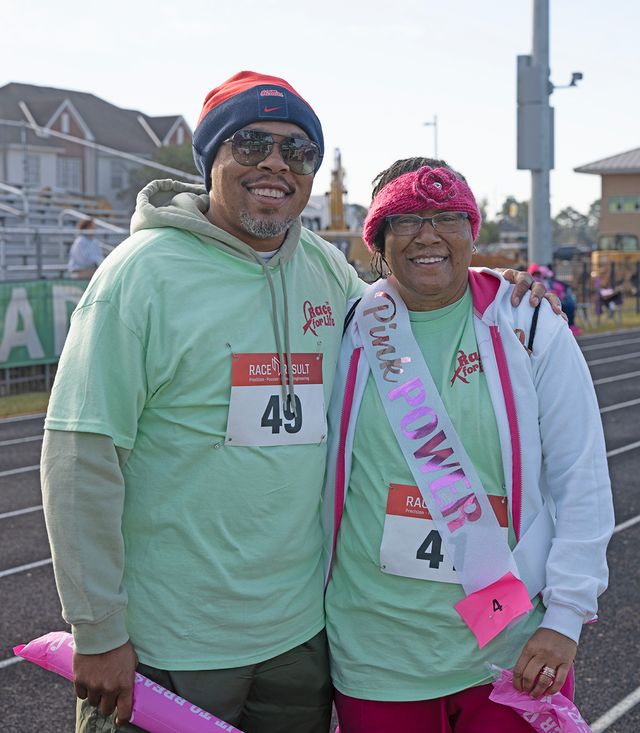 Kino Mosley and his mom Pam take a break at the Queen City Race for Life event held on the MCC Track. 