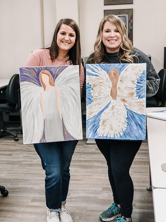 Friends and current and former students get creative during a painting party. Funds raised were earmarked for the Tanya Renia Ocampo Memorial Endowment.