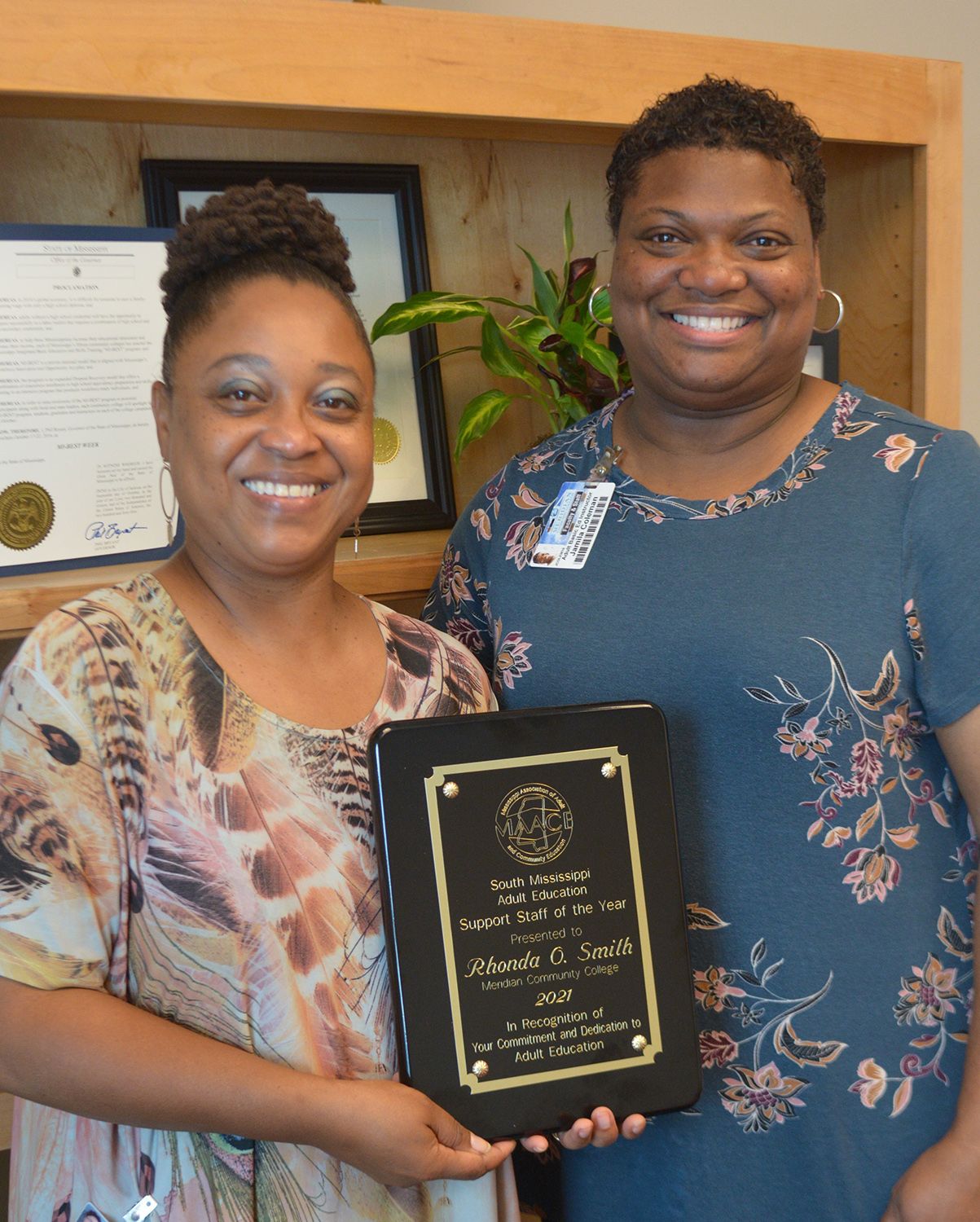 Rhonda Smith, left, with Jamila Brown Coleman. Smith was selected as South Mississippi Adult Education Support Staff Person of the Year. 