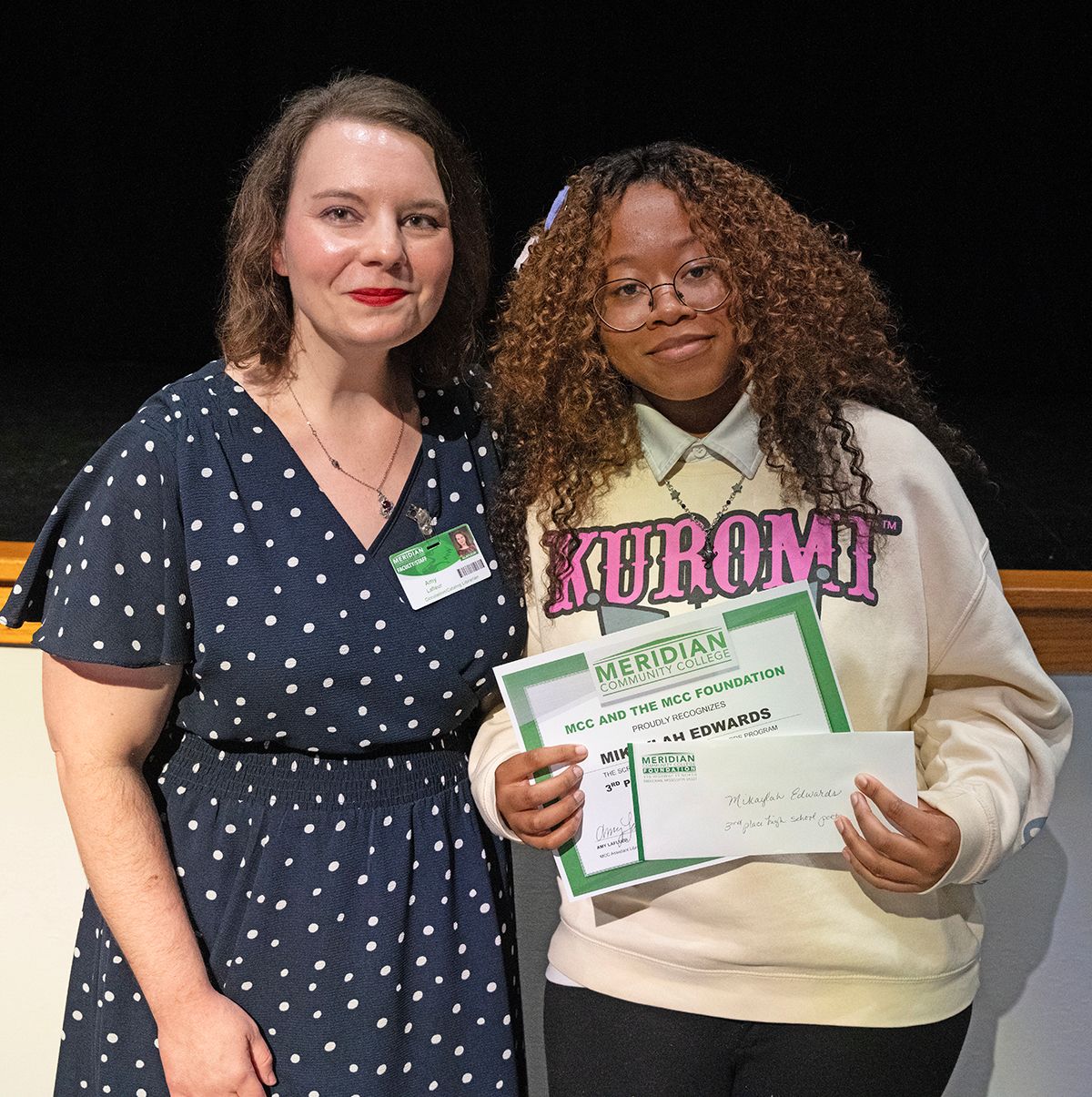 MCC assistant librarian Amy LaFleur poses with high school student Mikaylah Edwards.