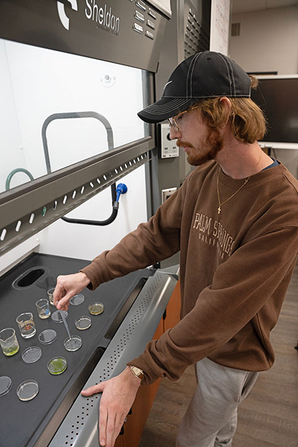 Samuel Swanner tests samples. 