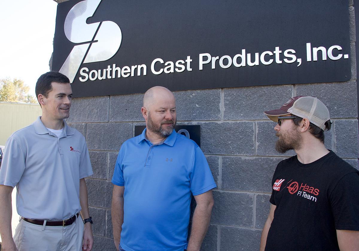 Daniel Wile, president of Southern Cast Products, Inc., talks with Brian Warren, division chair for the Industrial Technology division and the coordinator and instructor for the Precision Machining Engineering Technology Program at MCC, and Michael Bishop. Bishop is a sophomore in the MCC career and technical program.