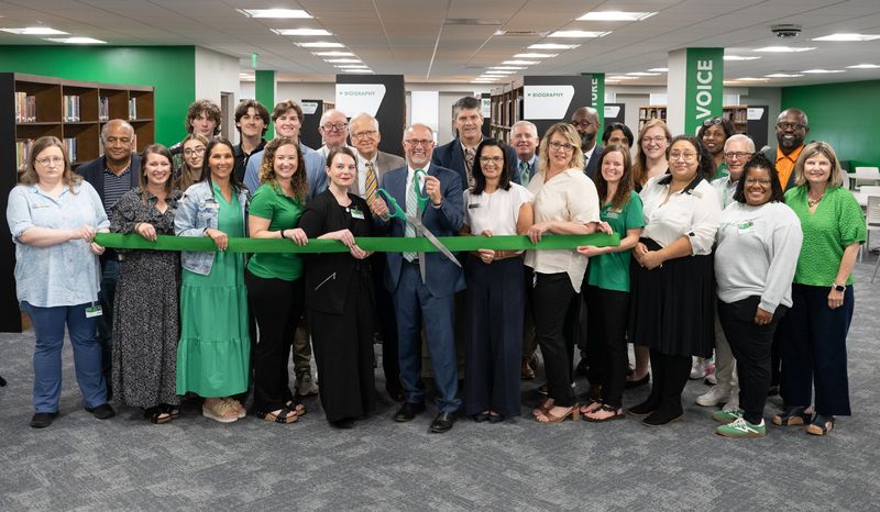 Meridian Community College faculty, staff, and supporters gather for a ribbon cutting celebrating the L.O. Todd/Billy C. Beal Student Success Center.