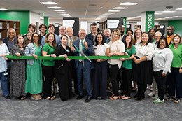 Meridian Community College faculty, staff, and supporters gather for a ribbon cutting celebrating the L.O. Todd/Billy C. Beal Student Success Center.