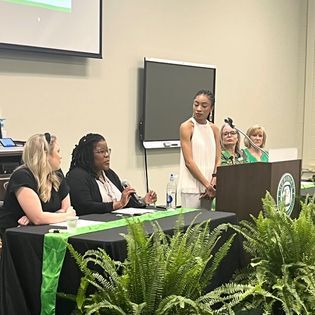 Callie Penson, Kimberly Rush, Kelli Wallace, Cyndy Bratu and Dr. Kelley Gonzales share their experiences during the Women’s History Month Celebration. 